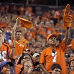 Denver Broncos fans cheer during the second half of the Broncos' NFL football game against the Baltimore Ravens, Thursday, Sept. 5, 2013, in Denver. (AP Photo/Jack Dempsey)
