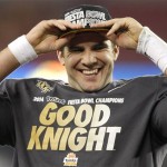 Central Florida quarterback Blake Bortles puts on his champions hat after the Fiesta Bowl NCAA college football game against Baylor, Wednesday, Jan. 1, 2014, in Glendale, Ariz. Central Florida won 52-42. (AP Photo/Rick Scuteri)