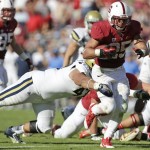 Stanford running back Tyler Gaffney runs against UCLA during the second half of an NCAA college football game on Saturday, Oct. 19, 2013, in Stanford, Calif. Stanford won 24-10. (AP Photo/Marcio Jose Sanchez)