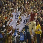  Auburn's Ryan White (19) and Chris Davis (11) break up a pass intended for Florida State's Nick O'Leary (35) during the first half of the NCAA BCS National Championship college football game Monday, Jan. 6, 2014, in Pasadena, Calif. (AP Photo/Mark J. Terrill)