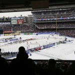  Fans watch during the first period of an outdoor NHL hockey game between the New Jersey Devils and the New York Rangers Sunday, Jan. 26, 2014, at Yankee Stadium in New York. (AP Photo/Frank Franklin II)