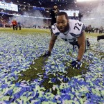 Seattle Seahawks' Michael Bennett celebrates after the NFL Super Bowl XLVIII football game Sunday, Feb. 2, 2014, in East Rutherford, N.J. The Seahawks won 43-8. (AP Photo/Ben Margot)