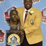 Hall of Fame inductee Warren Sapp poses with his bust during the 2013 Pro Football Hall of Fame Induction Ceremony Saturday, Aug. 3, 2013, in Canton, Ohio. (AP Photo/David Richard)
