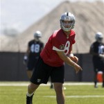 Oakland Raiders rookie quarterback Tyler Wilson throws a pass during NFL football rookie minicamp at the team's training facility in Alameda, Calif., Saturday, May 11, 2013. (AP Photo/Tony Avelar)
