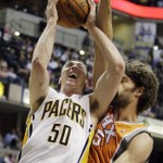 Indiana Pacers' Tyler Hansbrough (50) shoots against Phoenix Suns' Robin Lopez during the second half of an NBA basketball game, Friday, March 23, 2012, in Indianapolis. Phoenix won 113-111. (AP Photo/Darron Cummings)