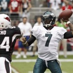 Philadelphia Eagles' Michael Vick (7) gets off a pass in front of Arizona Cardinals' Sam Acho (94) during the first half in an NFL football game Sunday, Sept. 23, 2012, in Glendale, Ariz.(AP Photo/Ross D. Franklin)