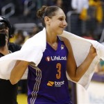 Phoenix Mercury's Diana Taurasi smiles after her team defeated the Los Angeles Sparks in Game 1 of their WNBA basketball Western Conference semifinal series on Thursday, Sept. 19, 2013, in Los Angeles. The Mercury won 86-75. (AP Photo/Danny Moloshok)