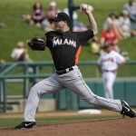 Miami Marlins pitcher Wade LeBlanc throws against the Atlanta Braves during the first inning of an exhibition spring training baseball game Monday, Feb. 25, 2013, in Kissimmee, Fla. (AP Photo/David J. Phillip)