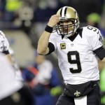 New Orleans Saints quarterback Drew Brees gestures in the second half of an NFL football game against the Seattle Seahawks, Monday, Dec. 2, 2013, in Seattle. (AP Photo/Scott Eklund)