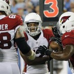 Arizona Cardinals wide receiver Andre Roberts, center, celebrates with teammates Adam Snyder (68) and Javarris James (45) after scoring on a three-yard pass play for a touchdown against the Tennessee Titans in the second quarter of an NFL football preseason game on Thursday, Aug. 23, 2012, in Nashville, Tenn. (AP Photo/Joe Howell)