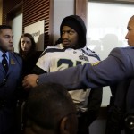 
Seattle Seahawks running back Marshawn Lynch arrives for a media availability escorted by members of the New Jersey State Police Thursday, Jan. 30, 2014, in Jersey City, N.J. The Seahawks and the Denver Broncos are scheduled to play in the Super Bowl XLVIII football game Sunday, Feb. 2, 2014. (AP Photo)