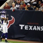  Minnesota Vikings wide receiver Jarius Wright, left, gestures to the crowd after scoring a 59-yard touchdown against the Houston Texans during the second half of an NFL preseason football game, Thursday, Aug. 30, 2012, in Houston. (AP Photo/Pat Sullivan)