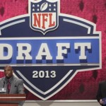Former Atlanta Falcons defensive back Deion Sanders is joined by NFL commissioner Roger Goodell as he announces a draft pick during the second round of the NFL Draft, Friday, April 26, 2013 at Radio City Music Hall in New York. (AP Photo/Mary Altaffer)