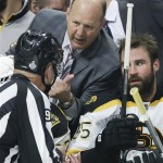 Boston Bruins coach Claude Julien talks to the referee in the second period during Game 5 of the NHL hockey Stanley Cup Finals against the Chicago Blackhawks, Saturday, June 22, 2013, in Chicago. (AP Photo/Nam Y. Huh)
