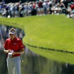 Ian Poulter of England takes notes on the 16th hole during a practice round for the Masters golf tournament Wednesday, April 6, 2011, in Augusta, Ga. (AP Photo/Matt Slocum)