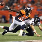 Denver Broncos linebacker Danny Trevathan (59) breaks up a pass intended for Baltimore Ravens tight end Dallas Clark (87) during the first half of an NFL football game, Thursday, Sept. 5, 2013, in Denver. (AP Photo/Jack Dempsey)