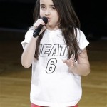 Julia Dale, 12, sings the national anthem before the first half of Game 6 of the NBA Finals basketball game between the Miami Heat and the San Antonio Spurs, Tuesday, June 18, 2013 in Miami. (AP Photo/Wilfredo Lee)