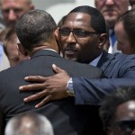 President Barack Obama hugs retired Baltimore Ravens linebacker Ray Lewis during a ceremony on the South Lawn of the White House in Washington, Wednesday, June 5, 2013, where the president honored the Super Bowl XLVII Super Bowl champions. The Ravens defeated the San Francisco 49ers in Super Bowl XLVII. (AP Photo/Evan Vucci)