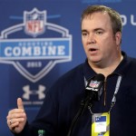 Green Bay Packers head coach Mike McCarthy answers a question during a news conference at the NFL football scouting combine in Indianapolis, Friday, Feb. 22, 2013. (AP Photo/Michael Conroy)