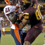 Arizona State wide receiver Kevin Ozier (82) pulls in a touchdown pass as Illinois defensive back Jack Ramsey (21) covers during the first half of an NCAA college football game, Saturday, Sept. 8, 2012, in Tempe, Ariz. (AP Photo/Matt York)
