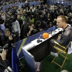 Denver Broncos' Peyton Manning answers a question during media day for the NFL Super Bowl XLVIII football game Tuesday, Jan. 28, 2014, in Newark, N.J. (AP Photo/Charlie Riedel)
