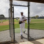 Detroit Tigers starting pitcher Justin Verlander runs off the field during a baseball spring training workout Tuesday, Feb. 12, 2013, in Lakeland, Fla. (AP Photo/Charlie Neibergall)