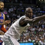 Boston Celtics center Kevin Garnett, right, reaches for the ball against New York Knicks center Tyson Chandler (6) during the second quarter in Game 6 of their first-round NBA basketball playoff series in Boston, Friday, May 3, 2013. (AP Photo/Charles Krupa)