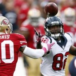 Houston Texans wide receiver Keshawn Martin, right, bobbles but recovers a pass from quarterback Matt Schaub as San Francisco 49ers defensive back Darryl Morris (40) defends in the first half of an NFL football game in San Francisco, Sunday, Oct. 6, 2013. (AP Photo/Beck Diefenbach)
