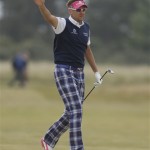 Ian Poulter of England gestures on the 16th fairway during the final round of the British Open Golf Championship at Muirfield, Scotland, Sunday, July 21, 2013. (AP Photo/Jon Super)