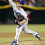 Los Angeles Dodgers' Zack Greinke delivers a pitch against the Arizona Diamondbacks during the first inning of a baseball game, Tuesday, Sept. 17, 2013, in Phoenix. (AP Photo/Matt York)