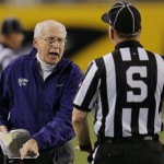  Kansas State head coach Bill Snyder, left, argues with side judge Bernie Hulscher during the first half of the Buffalo Wild Wings Bowl NCAA college football game against Michigan, Saturday, Dec. 28, 2013, in Tempe. (AP Photo/Matt York)