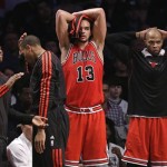From left, Chicago Bulls' Richard Hamilton, Marquis Teague, Malcolm Thomas, Joakim Noah (13) and Taj Gibson react from the bench in the second half of Game 5 of their first-round NBA basketball playoff series against the Brooklyn Nets, Monday, April 29, 2013, in New York. The Nets won 110-91. (AP Photo/Kathy Willens)