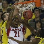 Louisville forward Chane Behanan (21) dunks against the Michigan during the first half of the NCAA Final Four tournament college basketball championship game Monday, April 8, 2013, in Atlanta. (AP Photo/Chris O'Meara)