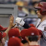 Arizona Diamondbacks' Paul Goldschmidt, right, is greeted by teammates after hitting a three-run home run in the ninth inning of a baseball game against the Pittsburgh Pirates on Saturday, Aug. 17, 2013, in Pittsburgh. The Diamondbacks won 15-5. (AP Photo/Keith Srakocic)