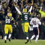 Green Bay Packers quarterback Seneca Wallace reacts after James Starks' 32-yard touchdown run during the first half of an NFL football game against the Chicago Bears Monday, Nov. 4, 2013, in Green Bay, Wis. (AP Photo/Jeffrey Phelps)