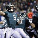 Philadelphia Eagles' Nick Foles drops back during the first half of an NFL wild-card playoff football game against the New Orleans Saints, Saturday, Jan. 4, 2014, in Philadelphia. (AP Photo/Matt Rourke)