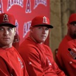 Los Angeles Angels players, from left, Josh Hamilton, Mike Trout and Albert Pujols attend a news conference at spring training baseball Thursday, Feb. 14, 2013, in Tempe, Ariz. (AP Photo/Morry Gash)