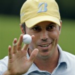 Matt Kuchar holds up his ball after putting on the eight green during the fourth round of the Masters golf tournament Sunday, April 14, 2013, in Augusta, Ga. (AP Photo/Matt Slocum)