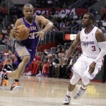 Phoenix Suns' Sebastian Telfair, left, drives past Los Angeles Clippers' Chris Paul during the first half of an NBA basketball game in Los Angeles, Thursday, March 15, 2012. (AP Photo/Jae C. Hong)