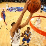 Team Webber's Anthony Davis of the New Orleans Pelicans shoots over Team Hill's Harrison Barnes of the Golden State Warriors during the Rising Star NBA All Star Challenge Basketball game,, Friday, Feb. 14, 2014, in New Orleans. (AP Photo/Christian Petersen)