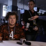 UCLA offensive lineman Jeff Baca is interviewed at the NFL football scouting combine in Indianapolis, Thursday, Feb. 21, 2013. (AP Photo/Michael Conroy)