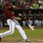Arizona Diamondbacks' Cody Ross connects for a three-run home run against the Miami Marlins during the eighth inning of a baseball game on Wednesday, June 19, 2013, in Phoenix. The Diamondbacks defeated the Marlins 3-1. (AP Photo/Ross D. Franklin)