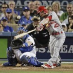  St. Louis Cardinals' Shane Robinson hits a home run during the seventh inning of Game 4 of the National League baseball championship series against the Los Angeles Dodgers Tuesday, Oct. 15, 2013, in Los Angeles. (AP Photo/Chris Carlson)