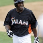 Miami Marlins non-roster invitee infielder Chone Figgins reacts after an at bat during the sixth inning of an exhibition spring training baseball game against the New York Mets, Tuesday, Feb. 26, 2013, in Jupiter, Fla. The Marlins won 7-5. (AP Photo/Julio Cortez)
