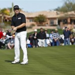 Padraig Harrington, of Ireland, watches his birdie putt attempt just miss the cup on the ninth hole during the first round of the Waste Management Phoenix Open golf tournament Thursday, Jan. 31, 2013, in Scottsdale, Ariz.(AP Photo/Ross D. Franklin)