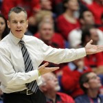 Florida's head coach Billy Donovan explains to an official why his call was wrong during the second half of an NCAA college basketball against Arizona game at McKale Center in Tucson, Ariz.,Saturday, Dec. 15, 2012. Arizona won 65-64. (AP Photo/John Miller)
