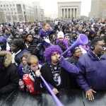 Baltimore Ravens fans blow horns during a victory ceremony at City Hall Tuesday, Feb. 5, 2013 in Baltimore. The Ravens defeated the San Francisco 49ers in NFL football's Super Bowl XLVII 34-31 on Sunday. (AP Photo/Gail Burton)(AP Photo/Gail Burton)
