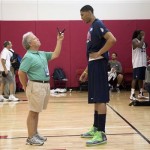Anthony Davis, right, of the New Orleans Pelicans is interviewed by a reporter after a USA Basketball mini camp practice, Monday, July 22, 2013, in Las Vegas. Twenty-eight of the best young players in the country are in Las Vegas for four days of workouts that essentially mark the kickoff of 2016 Olympic preparations. Davis, who played sparingly last summer, is the only player with Olympic experience. (AP Photo/Julie Jacobson)