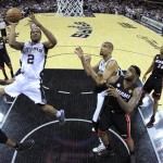 San Antonio Spurs' Kawhi Leonard (2) shoots against the Miami Heat during the second half at Game 4 of the NBA Finals basketball series, Thursday, June 13, 2013, in San Antonio. (AP Photo/Lucy Nicholson, Pool)