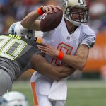 New Orleans Saints quarterback Drew Brees (9), of Team Rice, is sacked by Detroit Lions defensive tackle Ndamukong Suh (90), of Team Sanders, during the first quarter at the NFL Pro Bowl football game at Aloha Stadium, Sunday. Jan. 26, 2014, in Honolulu. (AP Photo/Marco Garcia)